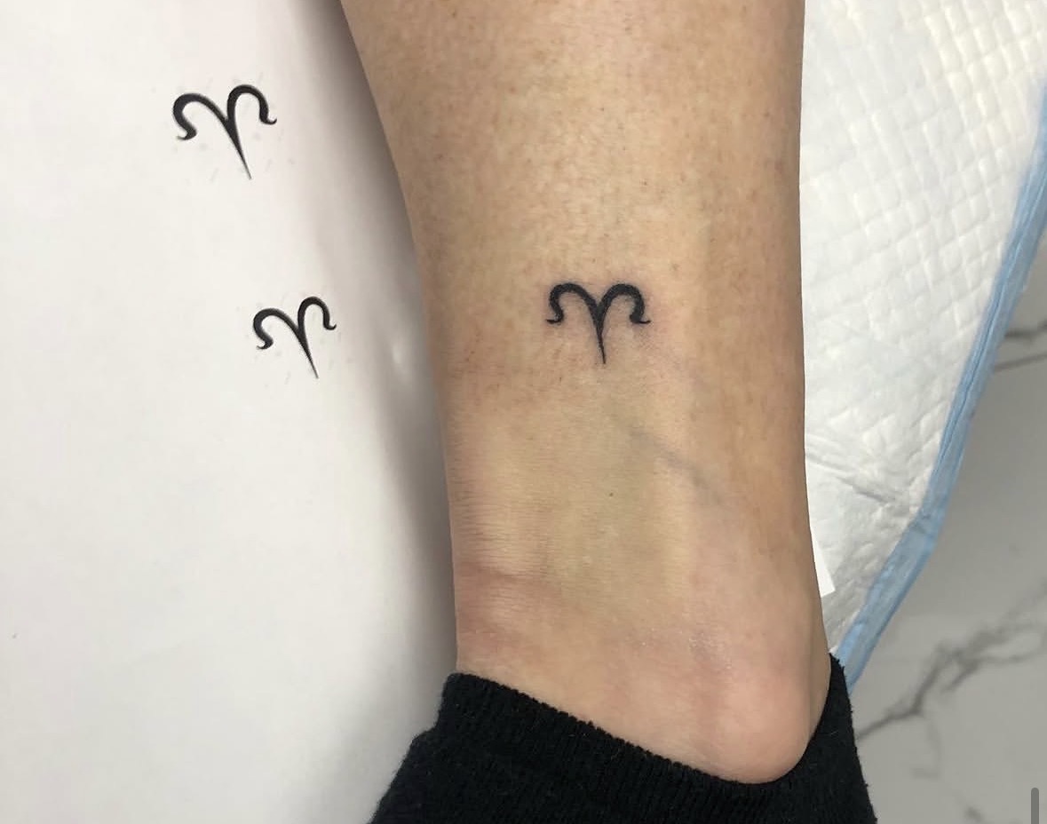 Deborah Joy Garrison — Minimalist Aries Symbol