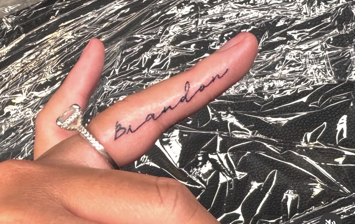 Delicate Name Script on Finger