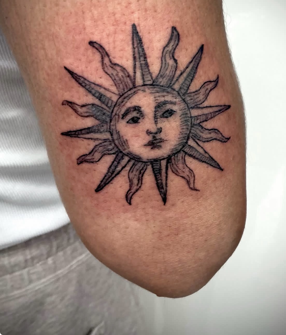 Vintage Woodcut Sun Face